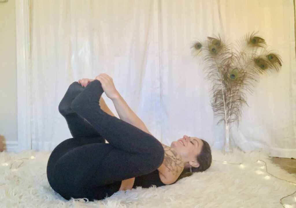 Happy Baby Yoga Pose - Ananda Balasana on shaggy carpet